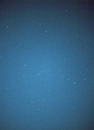 Iridium Flare, taken by David Forshaw at 23:17:50 BST on 6th July, 1998. Iridium 74, Magnitude -1, Elevation 30°, Azimuth 275° (W) Taken on Agfa CT200 slide film at f1.4. Taken 2 seconds before and after flare. Average total exposure time 9-10 seconds.